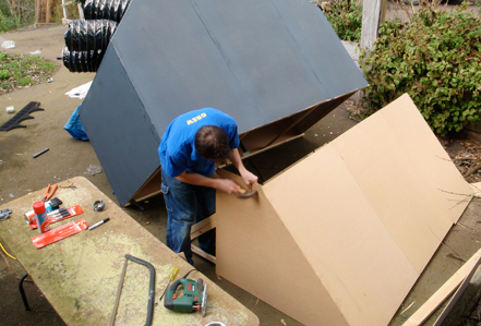 Chris busy nailing away. Chris is busy nailing away.